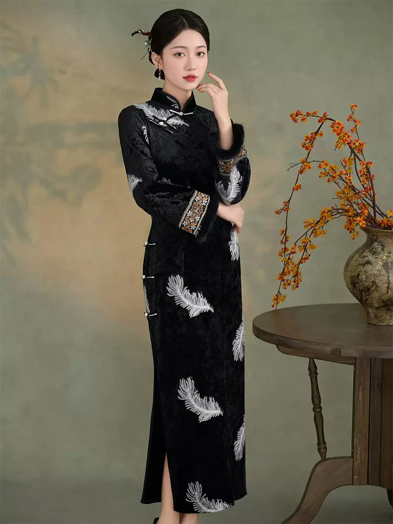Black velvet cheongsam with silver feather embroidery and soft plush cuffs