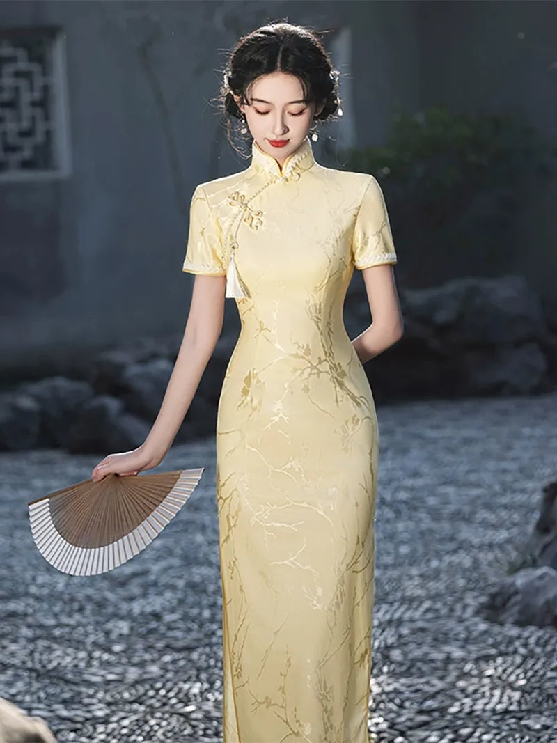 Goose yellow cheongsam with elegant jacquard details in modern Chinese styling