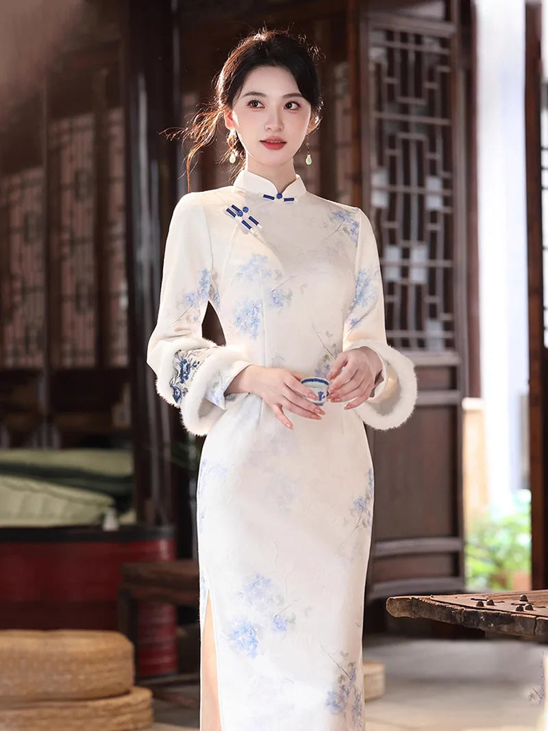 Long qipao dress with soft mist texture, blue pink floral print, and handcrafted frog buttons