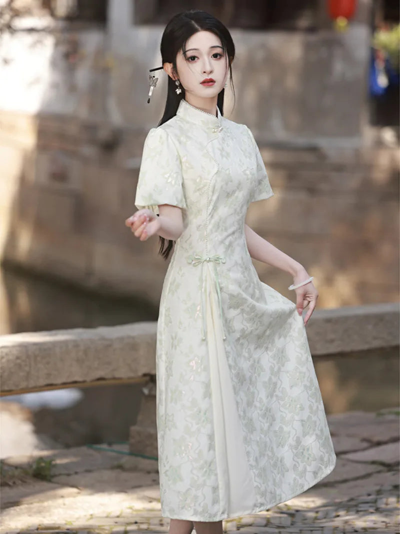 Elegant modern qipao dress in ivory with subtle jacquard texture