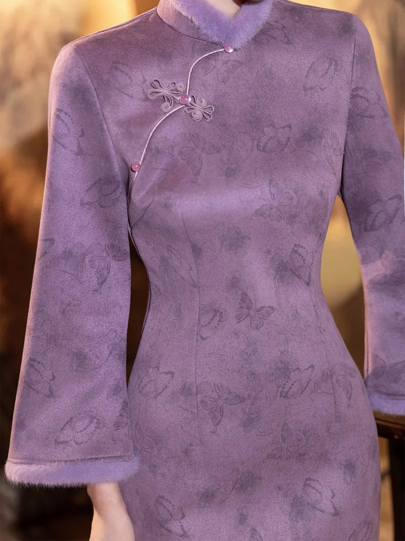 Warm purple winter qipao featuring soft suede fabric and a refined modern Chinese silhouette.