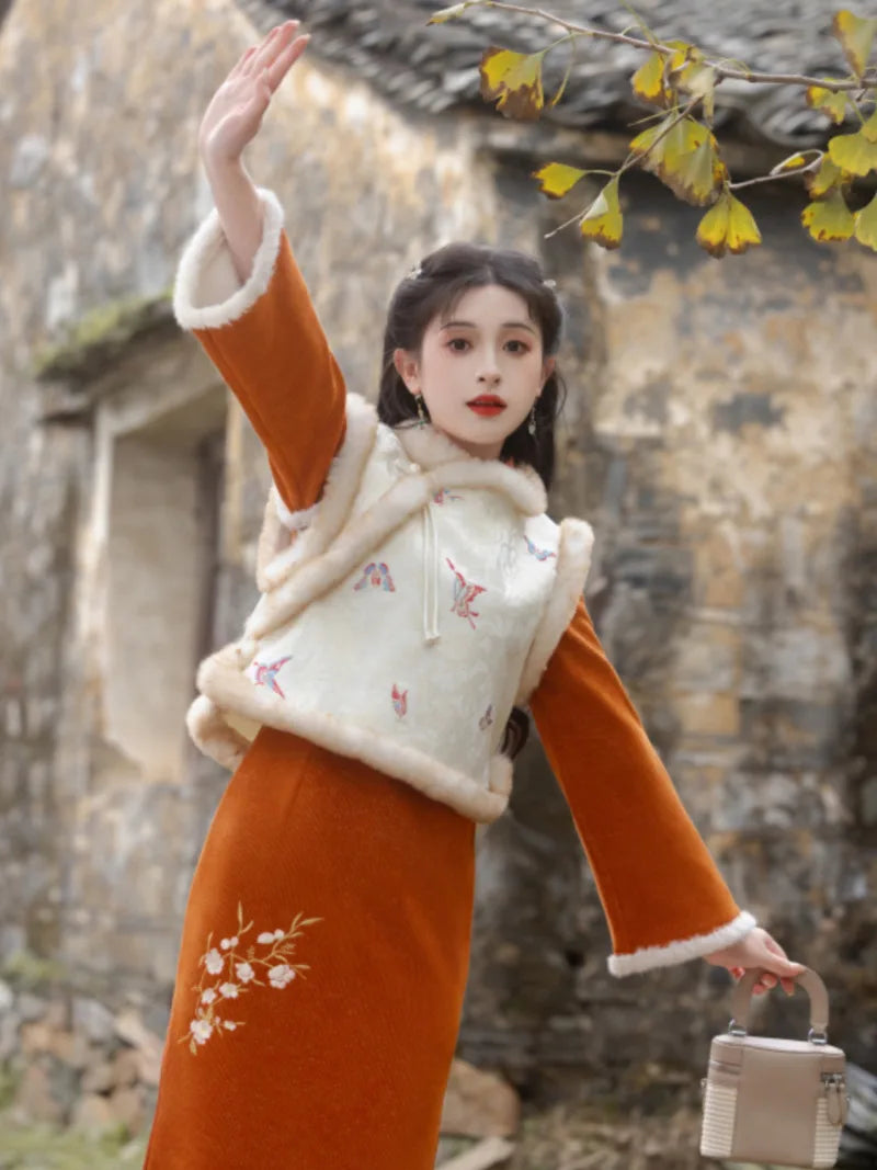 Qipao Chinese New Year embroidered winter dress for women, slim fit and elegant design.