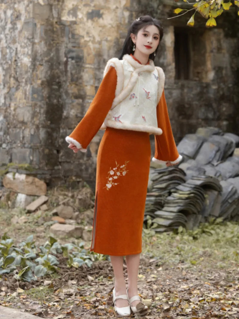 Qipao Chinese New Year embroidered winter dress for women, slim fit and elegant design.