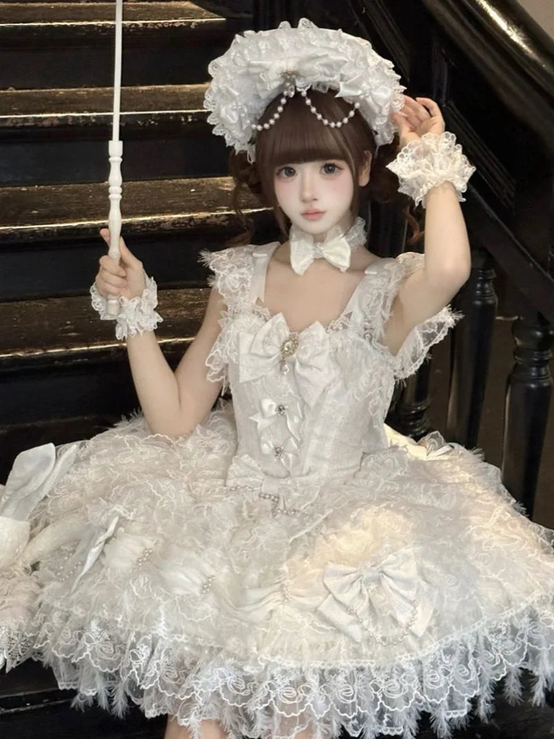 Sweety Angel Lolita JSK dress in soft white tea tones with elegant suspender design