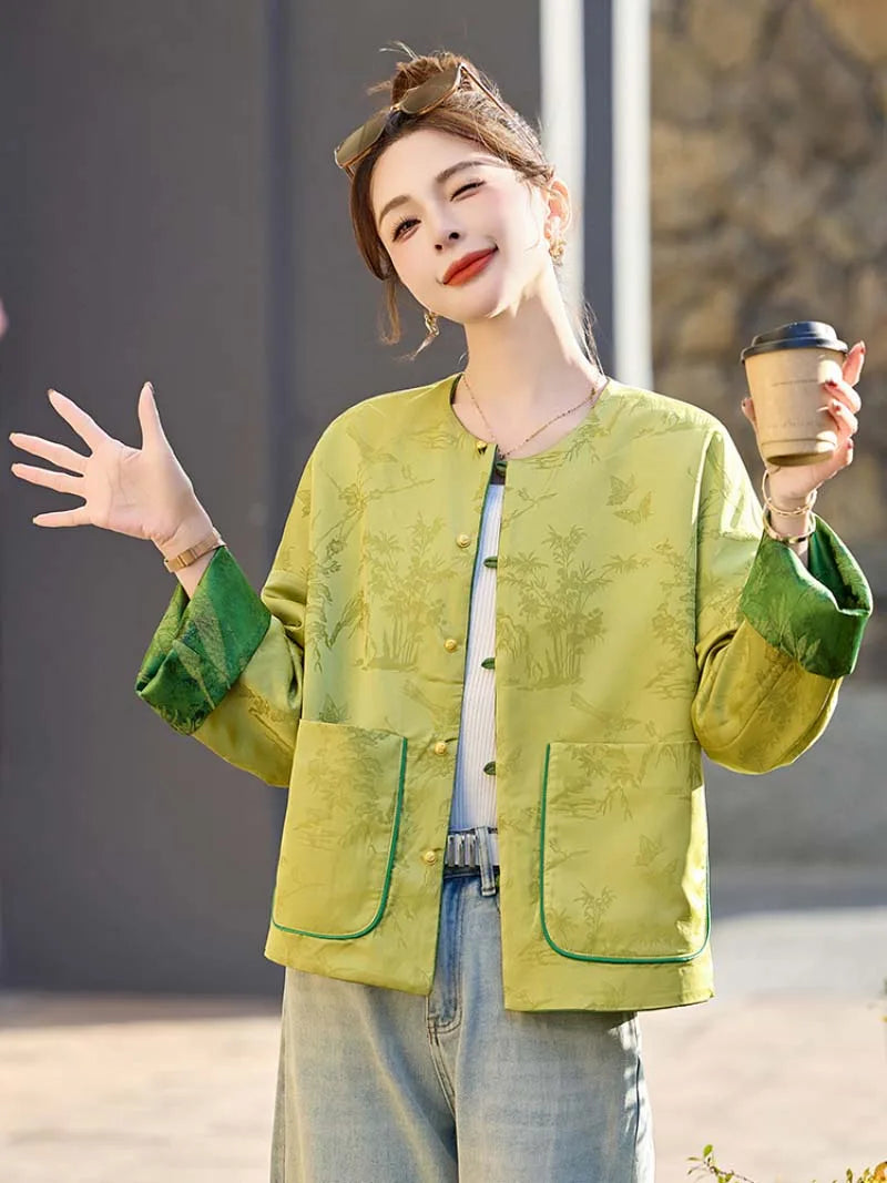 Elegant reversible Tang Suit for women featuring jacquard fabric, classic Chinese button design, and modern fashion silhouette.