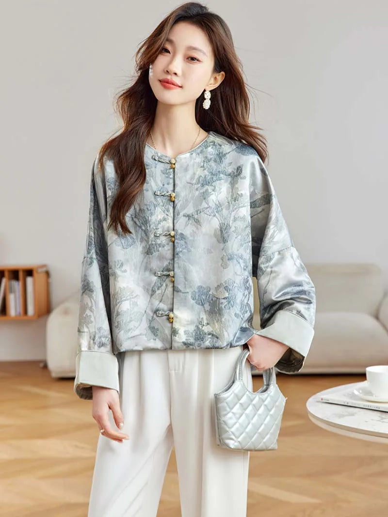 Elegant Tangzhuang jacket for women with jacquard fabric, classic pankou buttons, and modern Chinese vintage-inspired design