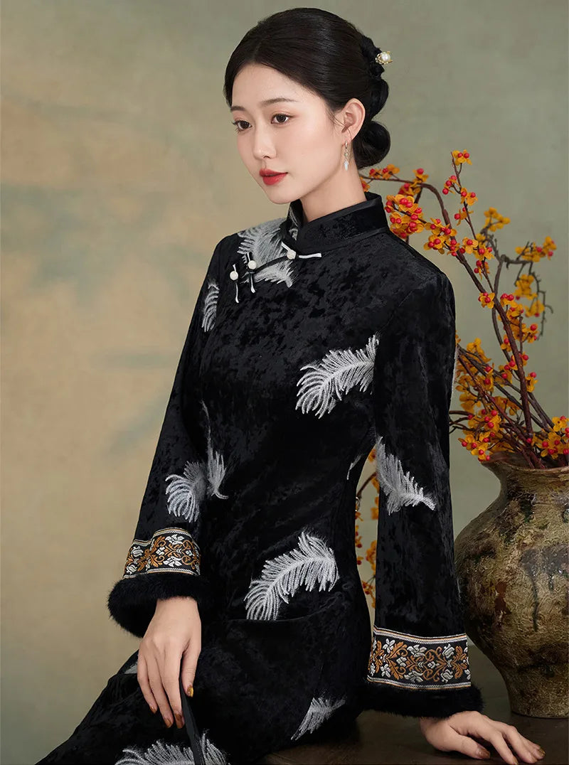 Black velvet cheongsam with silver feather embroidery and soft plush cuffs