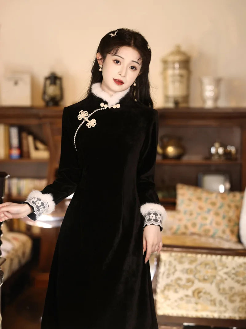 Modern black winter qipao featuring fleece lining and a sleek, flattering silhouette