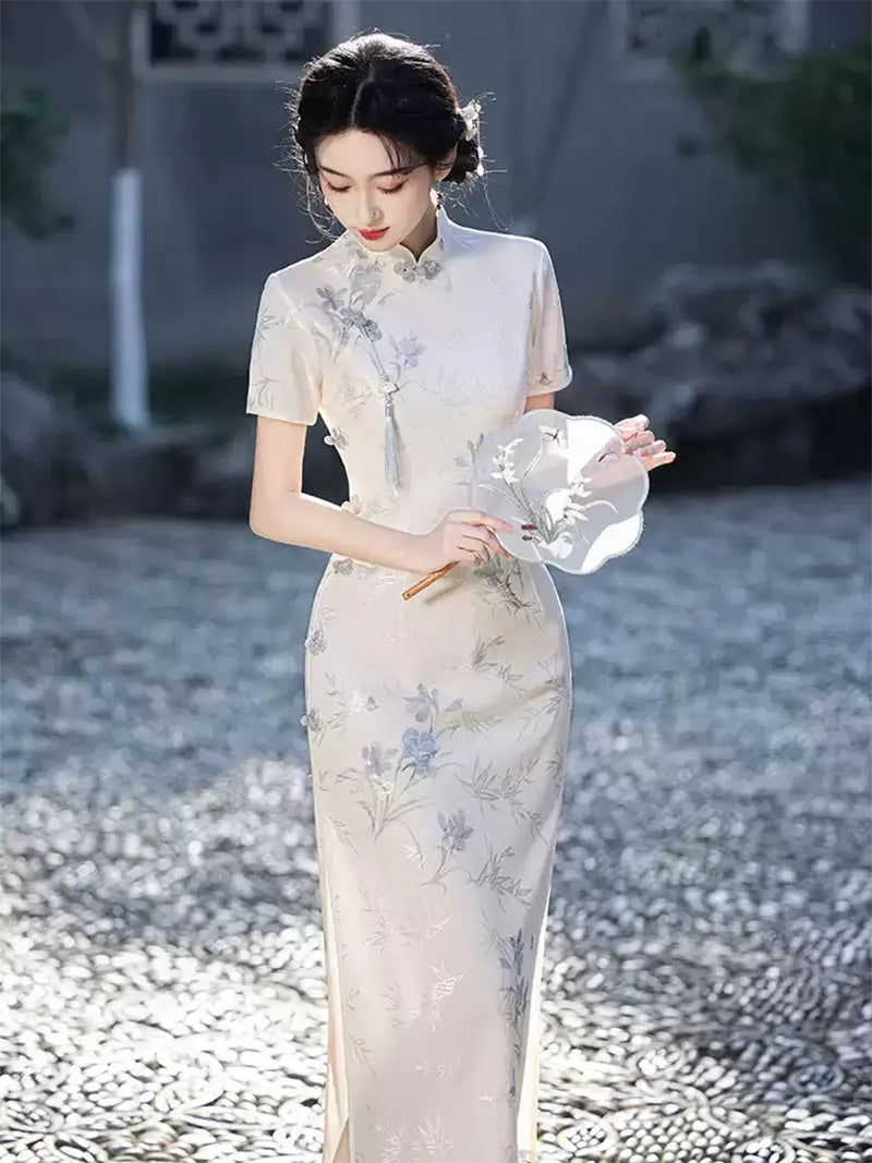 Elegant qipao with long sleeves featuring a refined collar and modern slim-fit silhouette for 2025 style