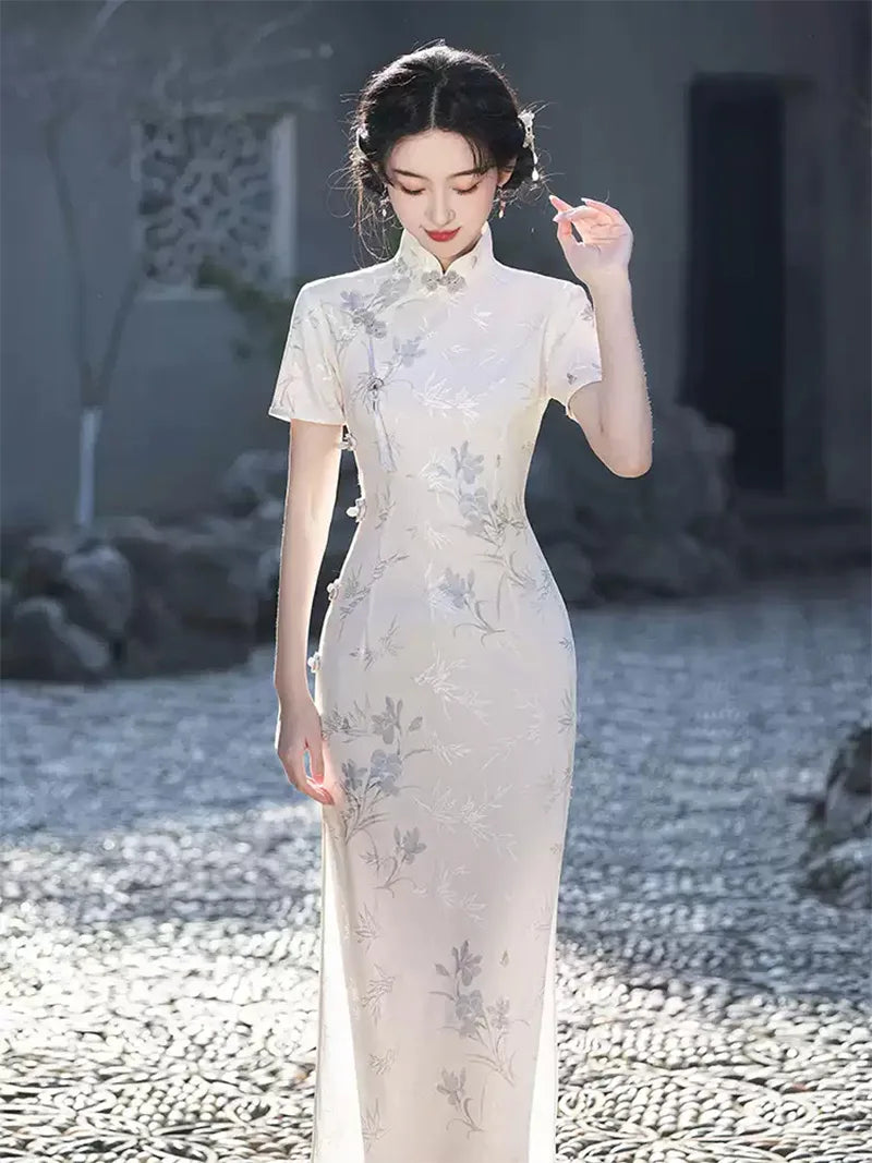 Elegant qipao with long sleeves featuring a refined collar and modern slim-fit silhouette for 2025 style