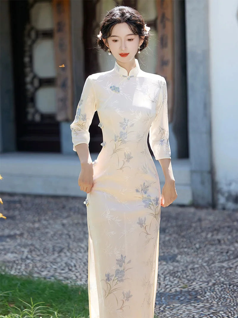 Elegant qipao with long sleeves featuring a refined collar and modern slim-fit silhouette for 2025 style