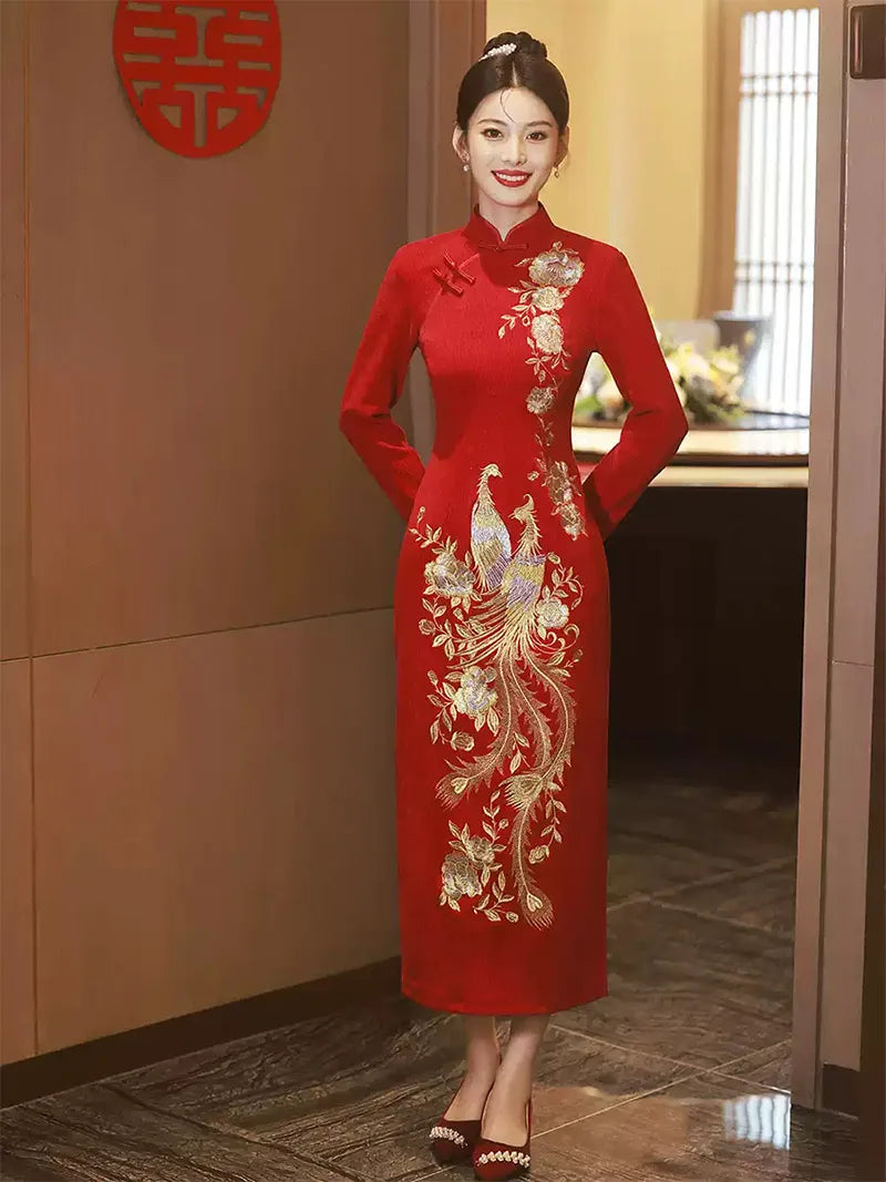 Embroidered wedding cheongsam in red satin with gold phoenix and peony design