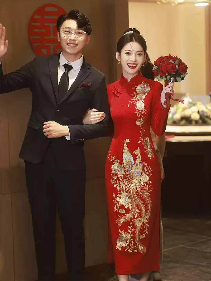 Embroidered wedding cheongsam in red satin with gold phoenix and peony design