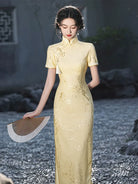 Goose yellow cheongsam with elegant jacquard details in modern Chinese styling