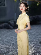 Goose yellow cheongsam with elegant jacquard details in modern Chinese styling