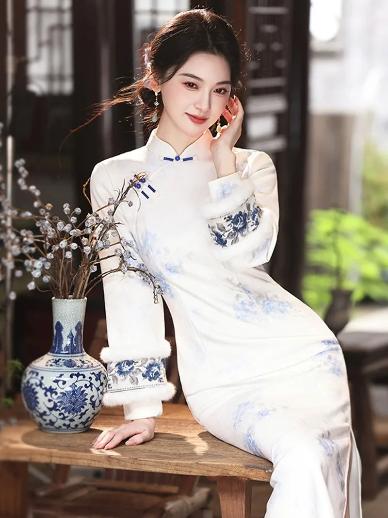 Long qipao dress with soft mist texture, blue pink floral print, and handcrafted frog buttons