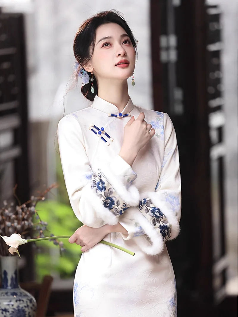 Long qipao dress with soft mist texture, blue pink floral print, and handcrafted frog buttons