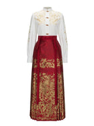 Red woven brocade mamian skirt with Ming-style cloud-shoulder hanfu, traditional Chinese festive dress for wedding toasts and New Year celebrations.