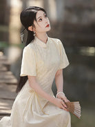 Elegant modern qipao dress in ivory with subtle jacquard texture