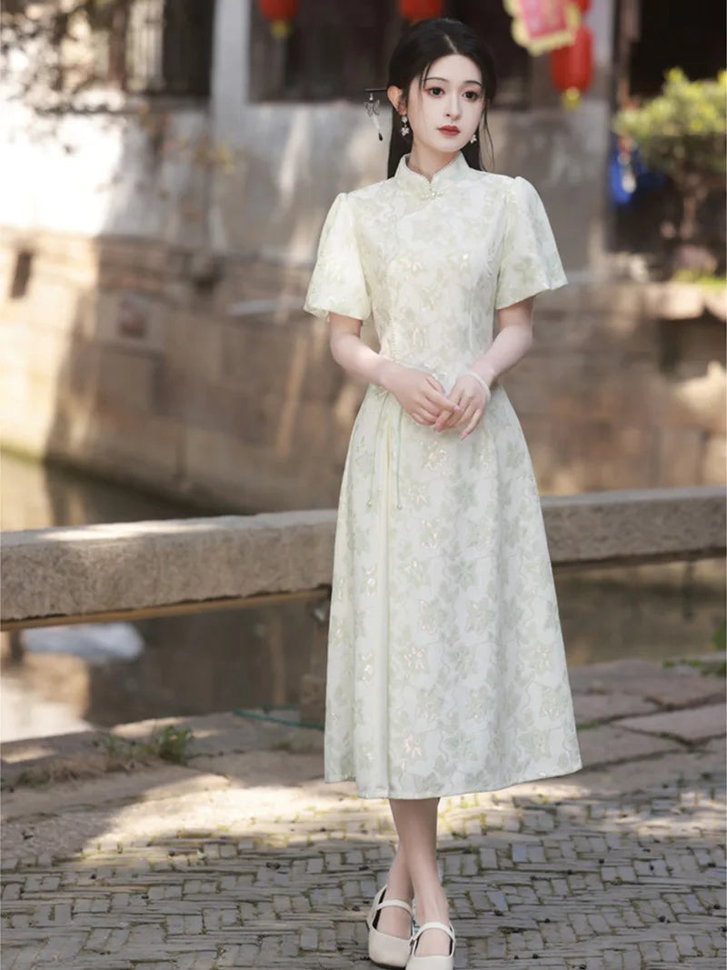 Elegant modern qipao dress in ivory with subtle jacquard texture