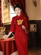 Elegant modern red Qipao wedding dress with long sleeves, perfect for autumn and winter brides