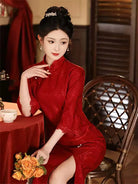 Elegant modern red Qipao wedding dress with long sleeves, perfect for autumn and winter brides