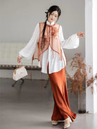Modernised hanfu with embroidered vest, mandarin collar shirt, and fishtail skirt in orange autumn style