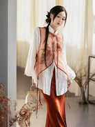 Modernised hanfu with embroidered vest, mandarin collar shirt, and fishtail skirt in orange autumn style
