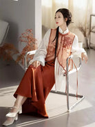Modernised hanfu with embroidered vest, mandarin collar shirt, and fishtail skirt in orange autumn style