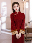Red fleece-lined New Year Cheongsam Dress with fitted waist, vintage charm and elegant neckline design