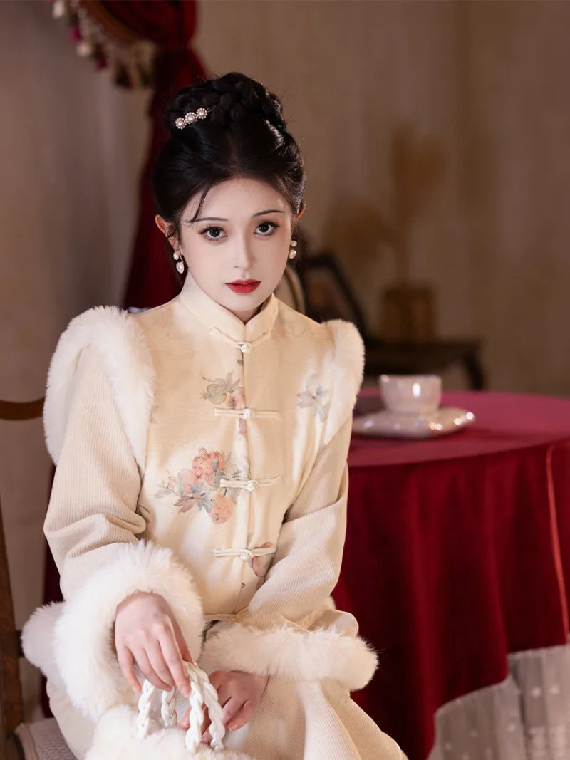 Red embroidered New Year Qipao featuring winter padding and modern Chinese styling