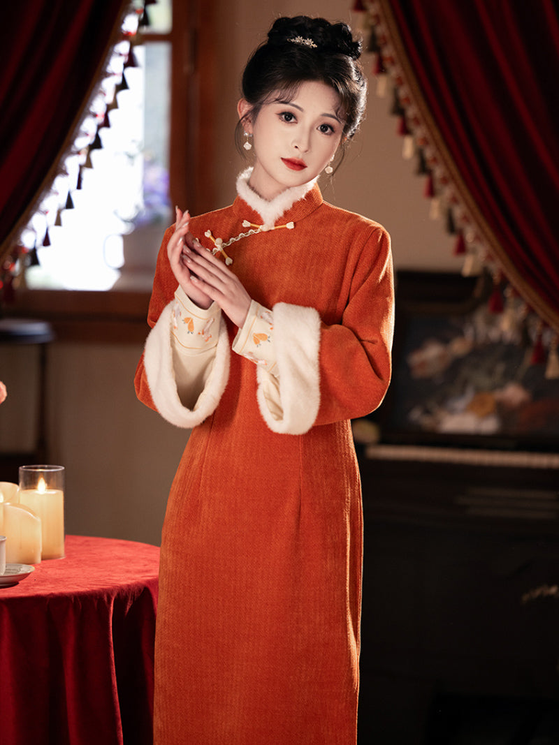 Orange cheongsam winter set with fleece lining and vest design for festive winter wear