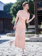 Pink qiapo dress with slim fit waistline and elegant slit for summer wear