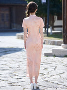 Pink qiapo dress with slim fit waistline and elegant slit for summer wear
