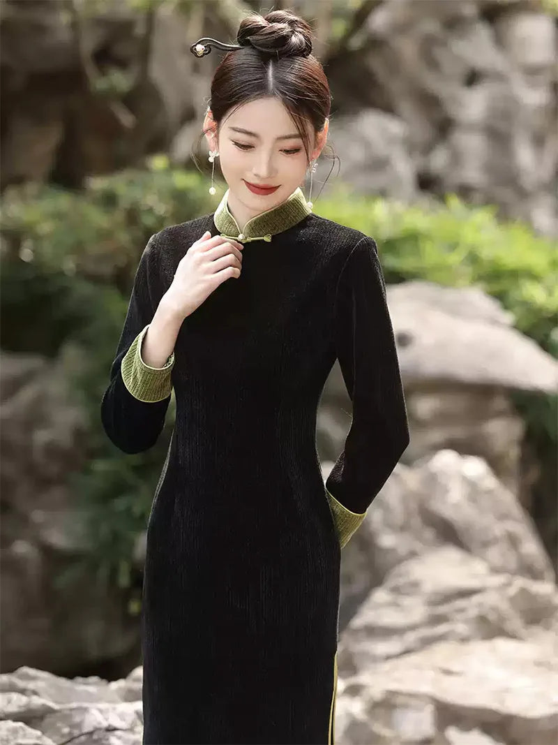 Qipao tea ceremony dress in black corduroy with jade green piping and slim silhouette