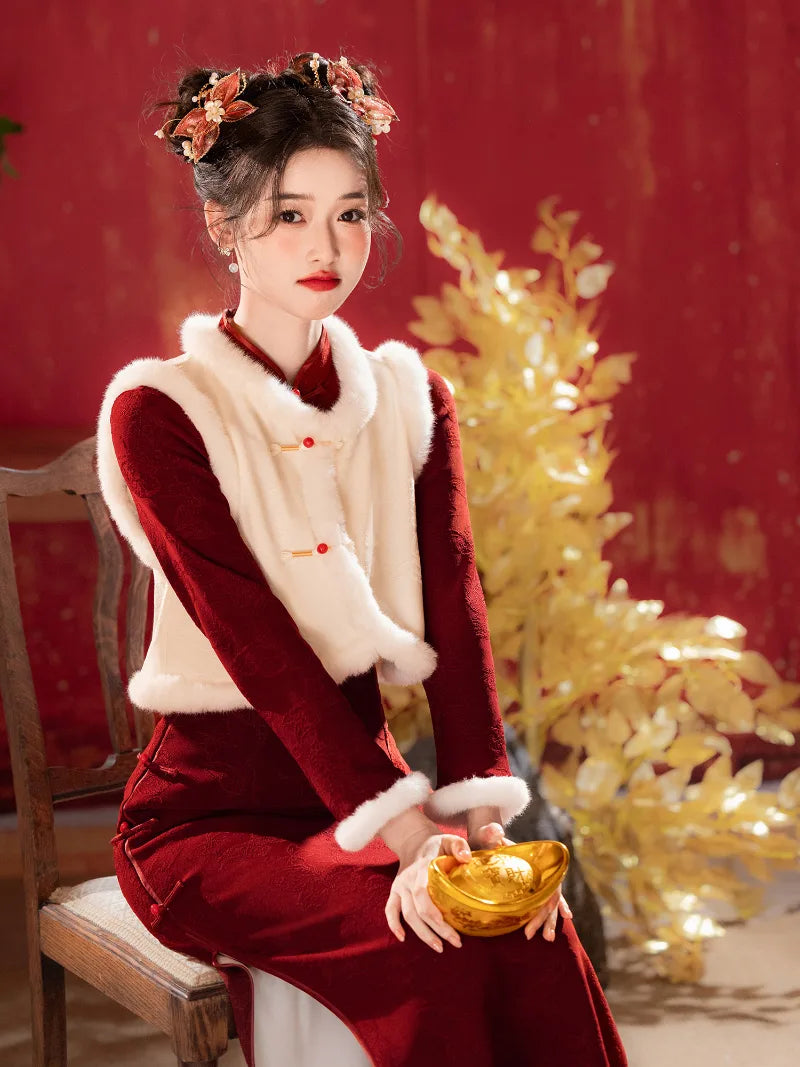 Red winter qipao with classic collar and elegant floral design for New Year celebrations