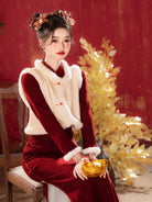 Red winter qipao with classic collar and elegant floral design for New Year celebrations