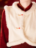 Red winter qipao with classic collar and elegant floral design for New Year celebrations