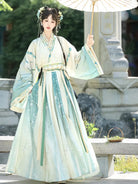 Elegant Wei Jin Dynasty Hanfu with cross-collar top and flowing Qiyao skirt design