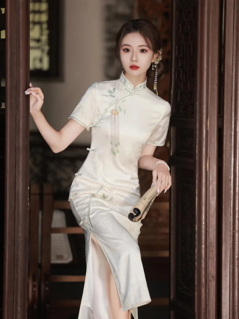 White Cheongsam dress with delicate embroidery, modern Chinese style, elegant summer silhouette