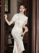 White Cheongsam dress with delicate embroidery, modern Chinese style, elegant summer silhouette