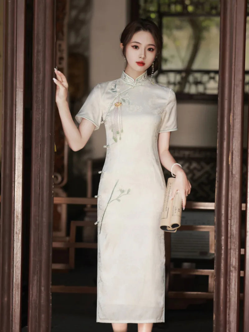 White Cheongsam dress with delicate embroidery, modern Chinese style, elegant summer silhouette
