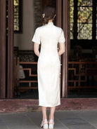 White Cheongsam dress with delicate embroidery, modern Chinese style, elegant summer silhouette