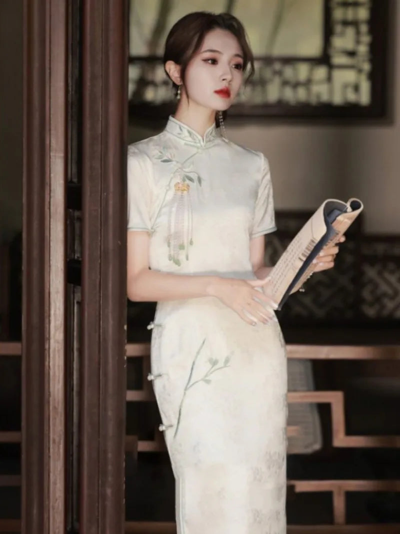 White Cheongsam dress with delicate embroidery, modern Chinese style, elegant summer silhouette