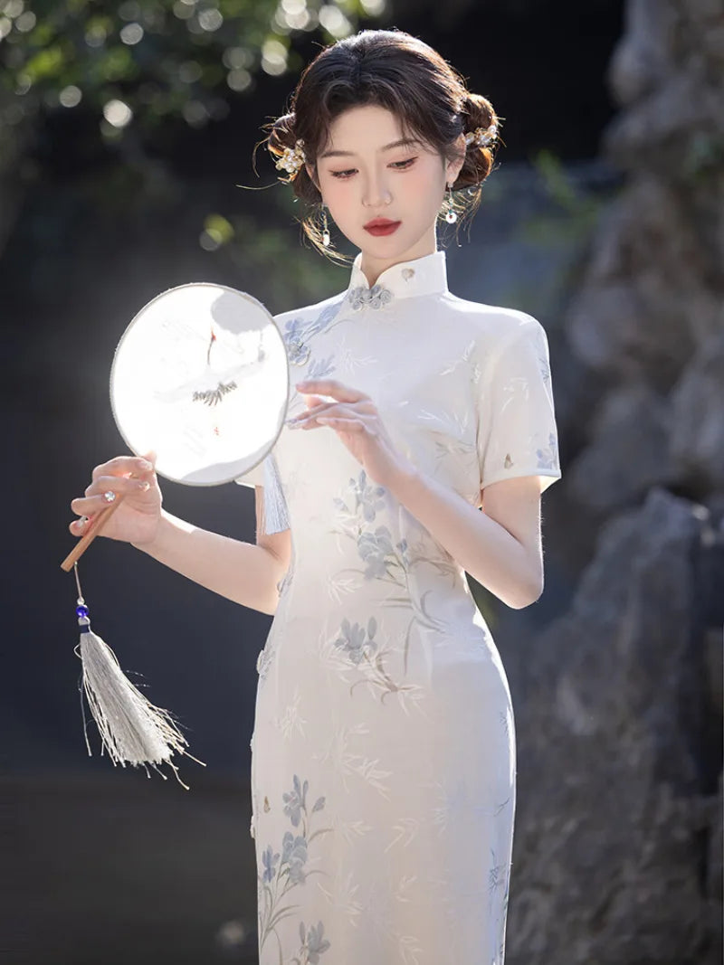 White Qipao Dress with modern Chinese style, stand collar and elegant slim silhouette