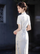 White Qipao Dress with modern Chinese style, stand collar and elegant slim silhouette