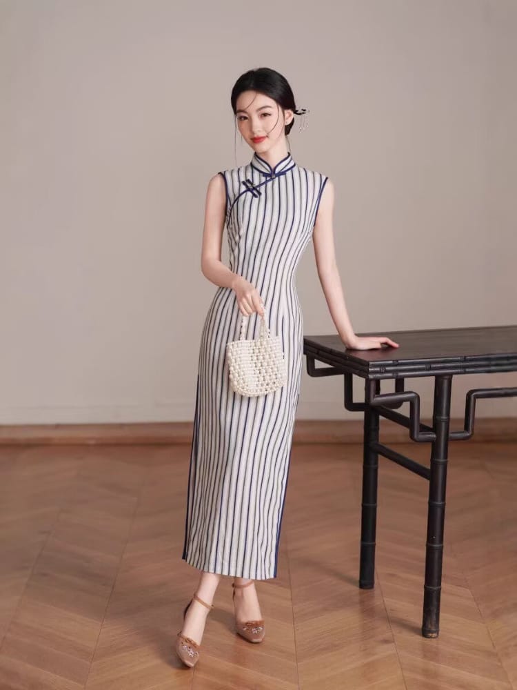 Chloe Sleeveless Vertical‑Striped Cotton Midi Cheongsam