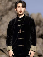 Black Tang suit for men featuring velvet fabric, frog buttons, and loose-fit Chinese traditional jacket design for spring or festive occasions.