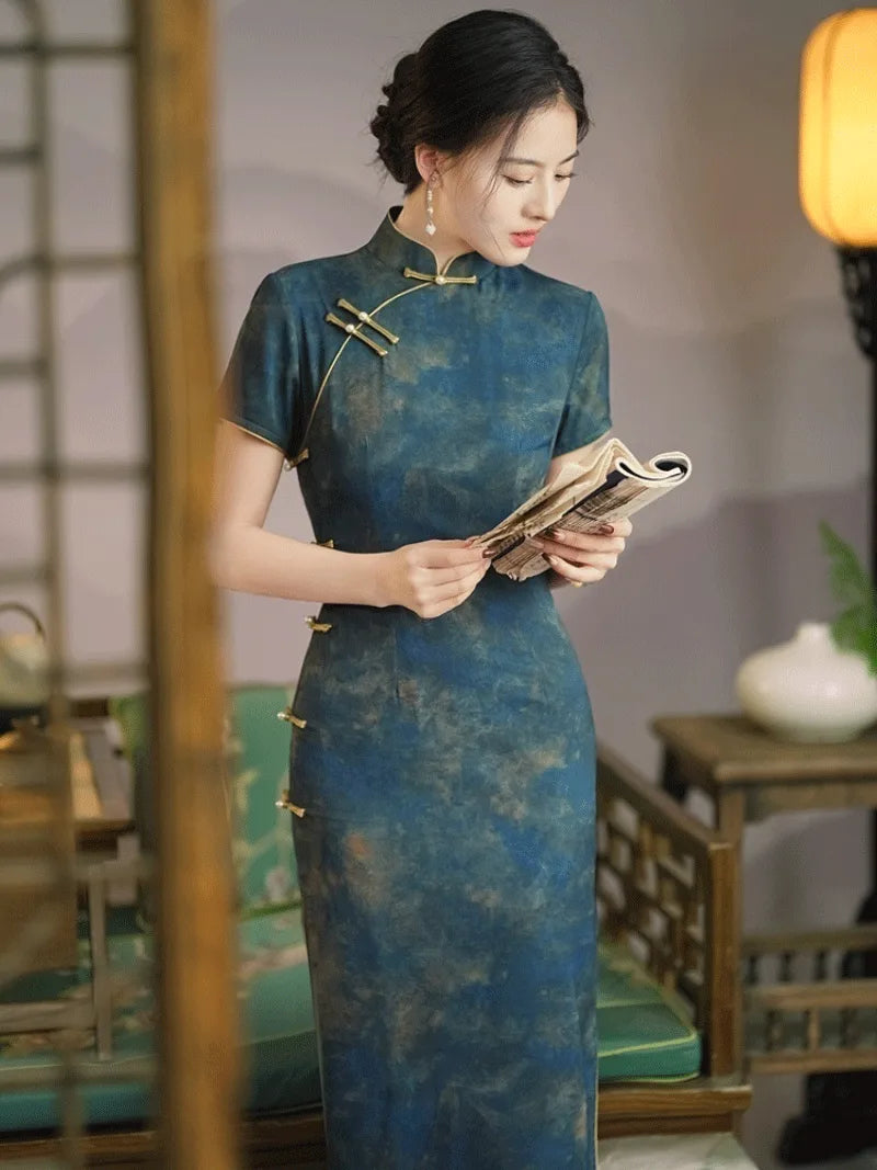 Elegant blue qipao with modern Chinese design, vintage charm, and daily wearable style
