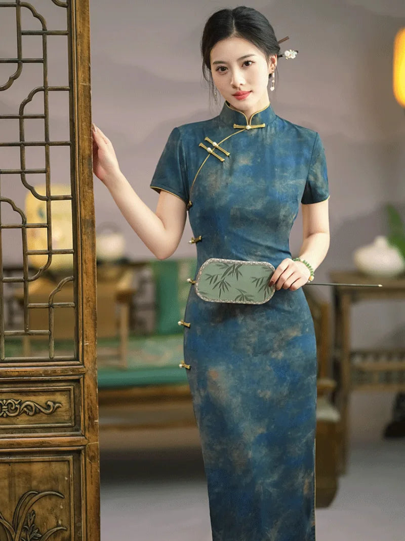 Elegant blue qipao with modern Chinese design, vintage charm, and daily wearable style